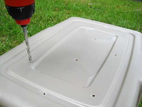 compoststep2 drilling holes in bottom of diy compost bin