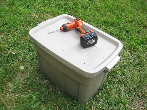 compoststep8 completed diy compost bin in plastic container with holes in top