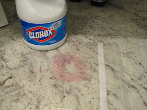 how-to-remove-a-granite-stain-counter Plastic bag soaking on granite counter stain