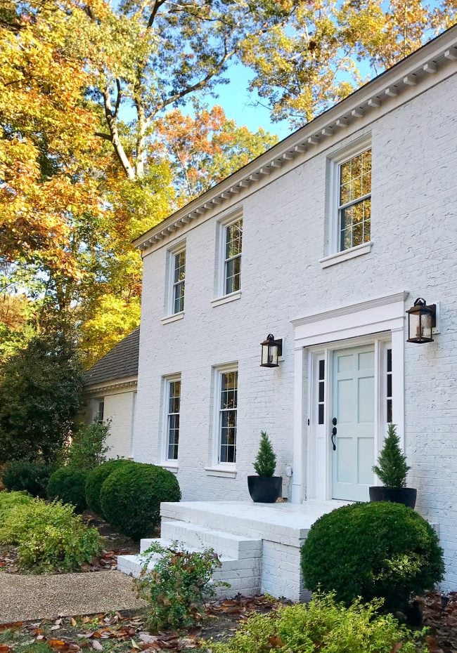 Painted Brick House White AFTER Door With Foliage