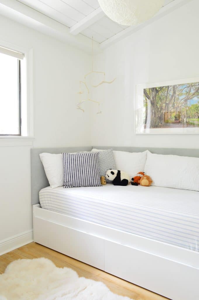 Boys daybed with upholstered DIY headboard on two sides