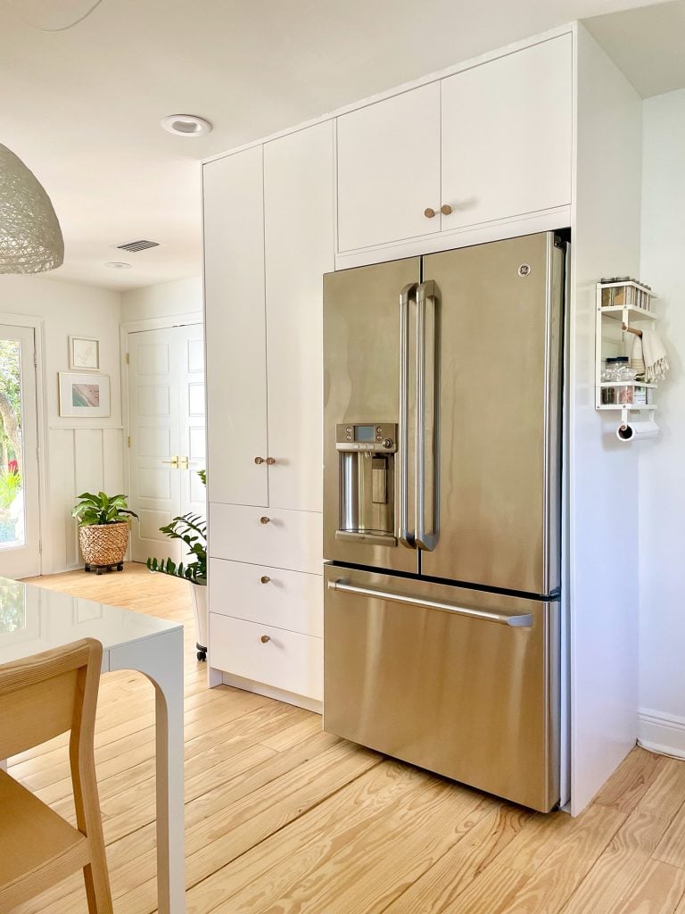 Ikea Built-In Pantry Cabinets Around Stainless Steel Refrigerator