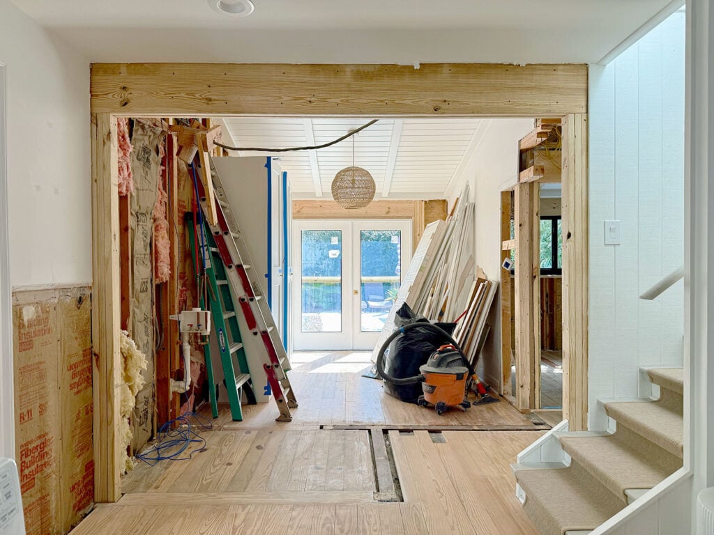 View Of Opened Wall To French Doors During Renovation